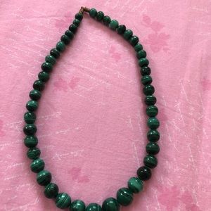 Malachite bead , natural stone mineral .